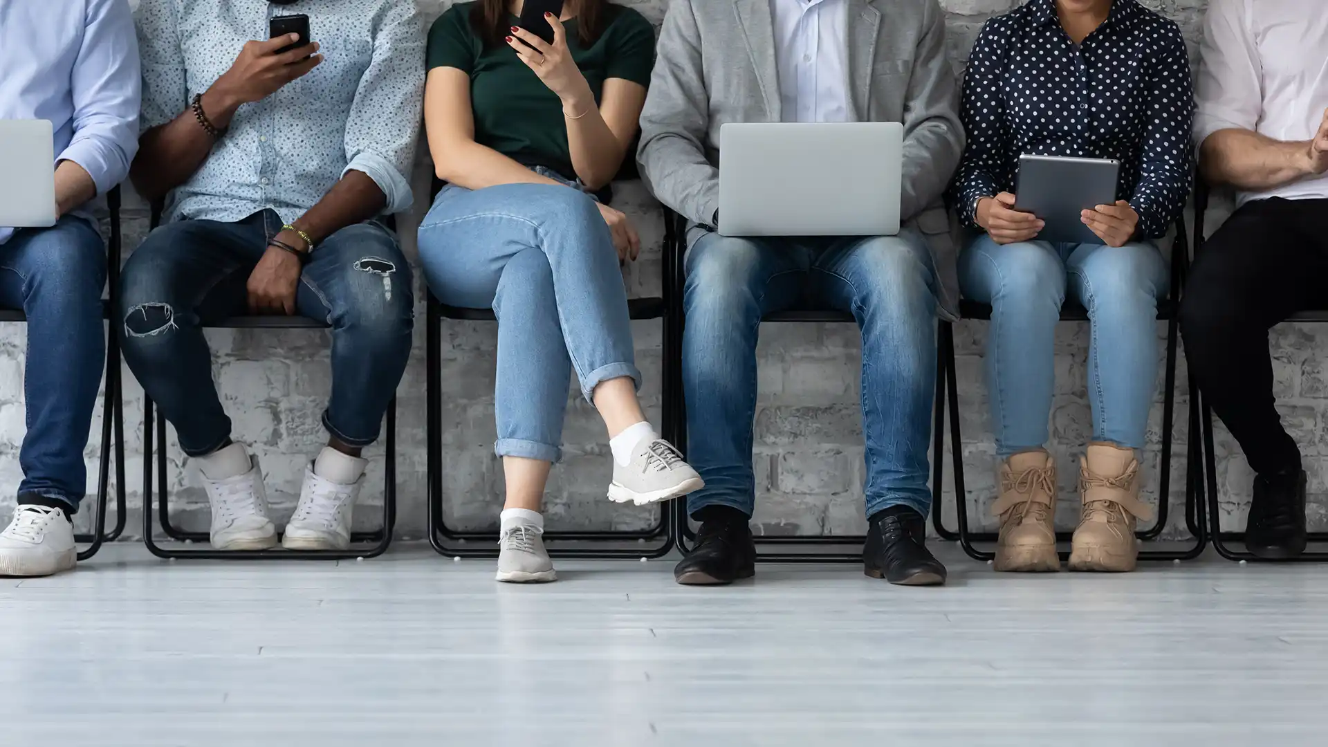 Line of people waiting to interview for a job.